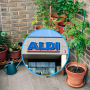 Drewniany wózek pod rośliny z Aldi